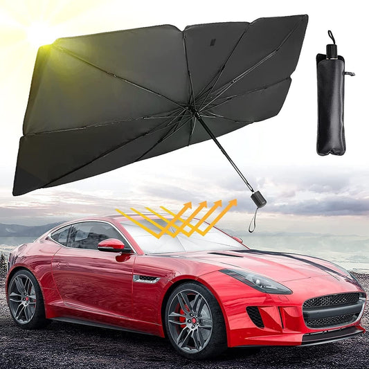 Black umbrella with carrying case over a red car on a scenic background, Foldable windshield umbrella heat protector deployed on car front window for sun protection