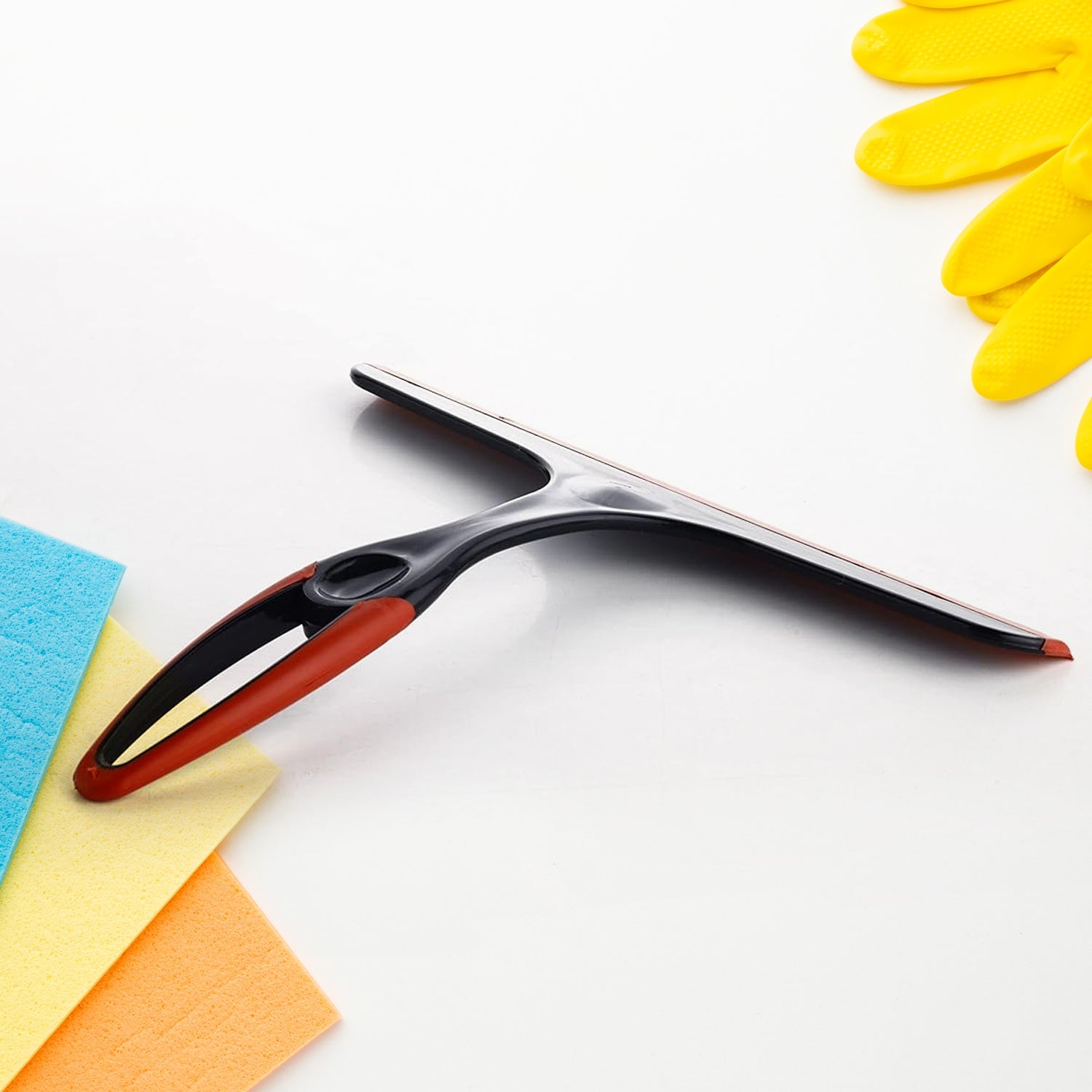 Kitchen wiper with hanging provision and sturdy handle