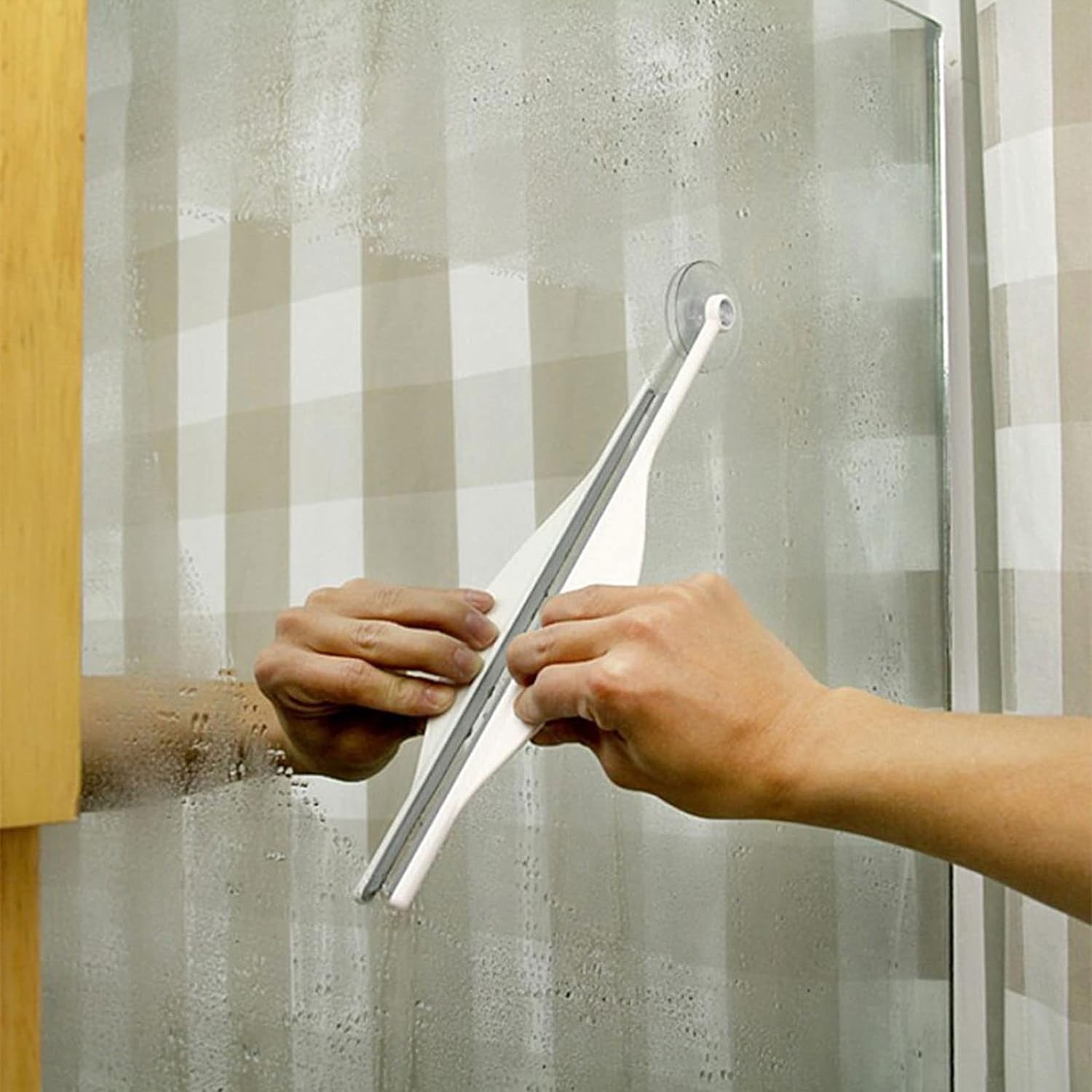 Compact bathroom mirror wiper for limescale and water stains