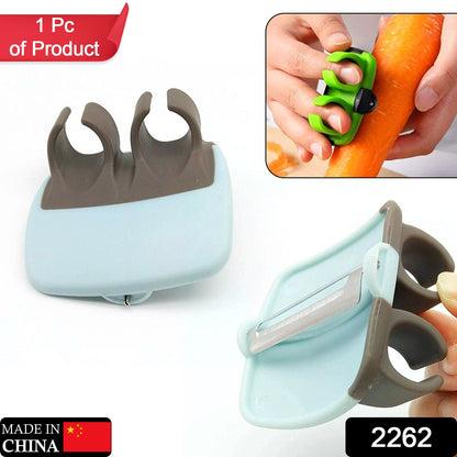 hand palm peeler, vegetable peeler tool, potato peeler with finger grip, kitchen fruit peeler, palm grip peeler, rubber grip peeler, quick peel kitchen tool