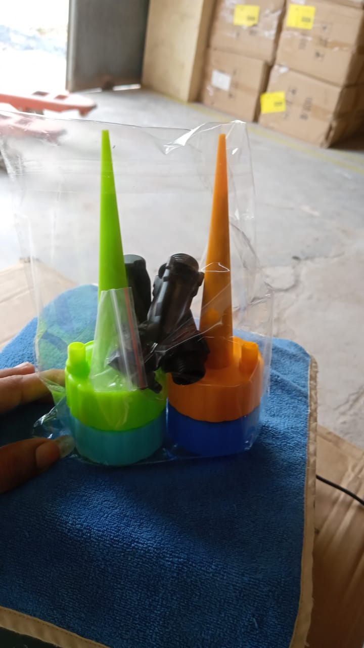 adjustable self watering spikes plant watering devices 4 pc set, automatic drip irrigation spikes with control valve India, bottle‑fed plant watering spikes for potted plants, reusable self watering plant drip spikes with valve, self watering system for indoor outdoor plants 4 pack

