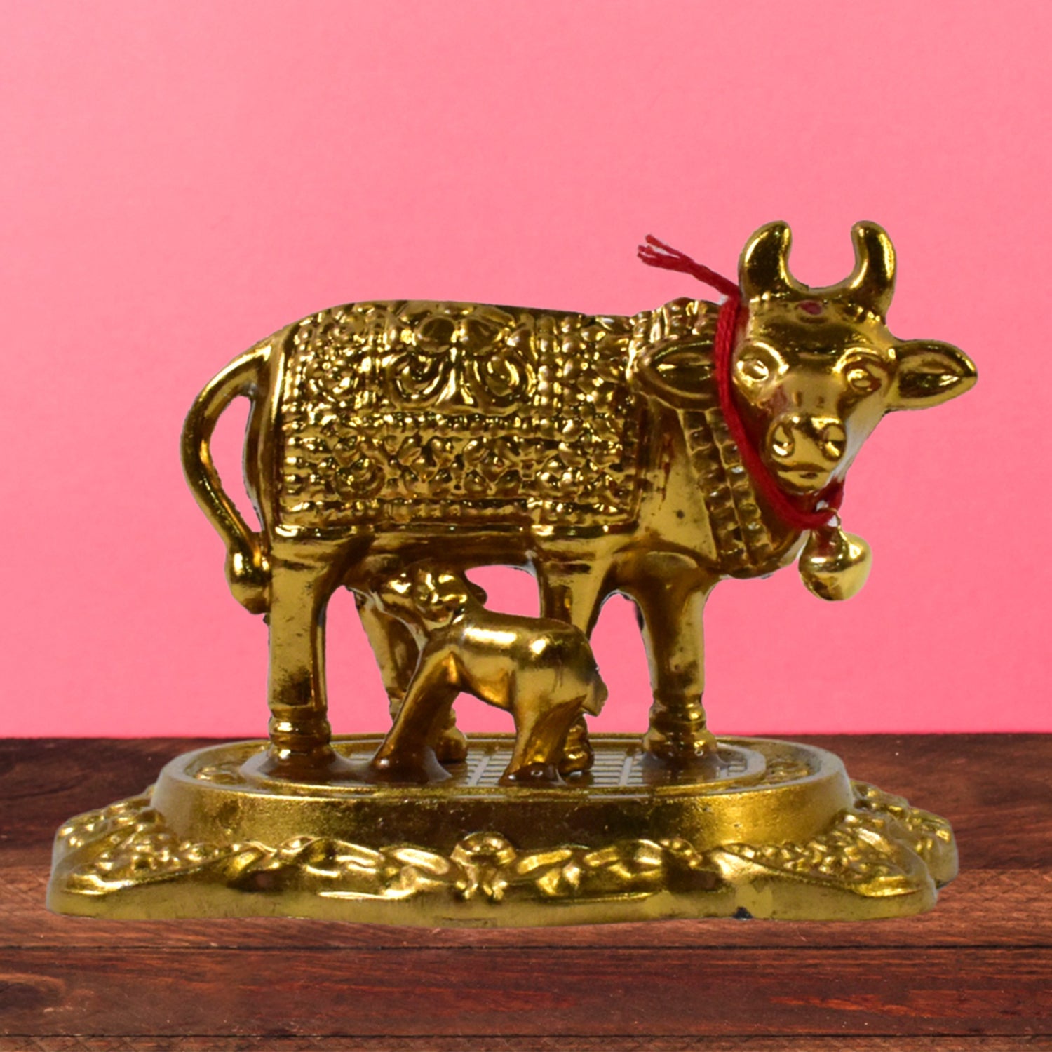 Kamdhenu cow idol, Kamadhenu cow with calf, metal cow idol India, Kamdhenu statue for home, golden cow idol for pooja, decorative cow and calf statue, Kamdhenu idol brass finish, vastu cow idol, metal Kamadhenu murti, pooja room cow statue

