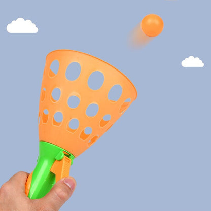 Entertaining catapult butt ball toy for kids' outdoor fun and games, butt ball toy, catapult toy for kids, funny slingshot game, kids outdoor toy, novelty toy for kids, plastic slingshot toy, indoor game for children