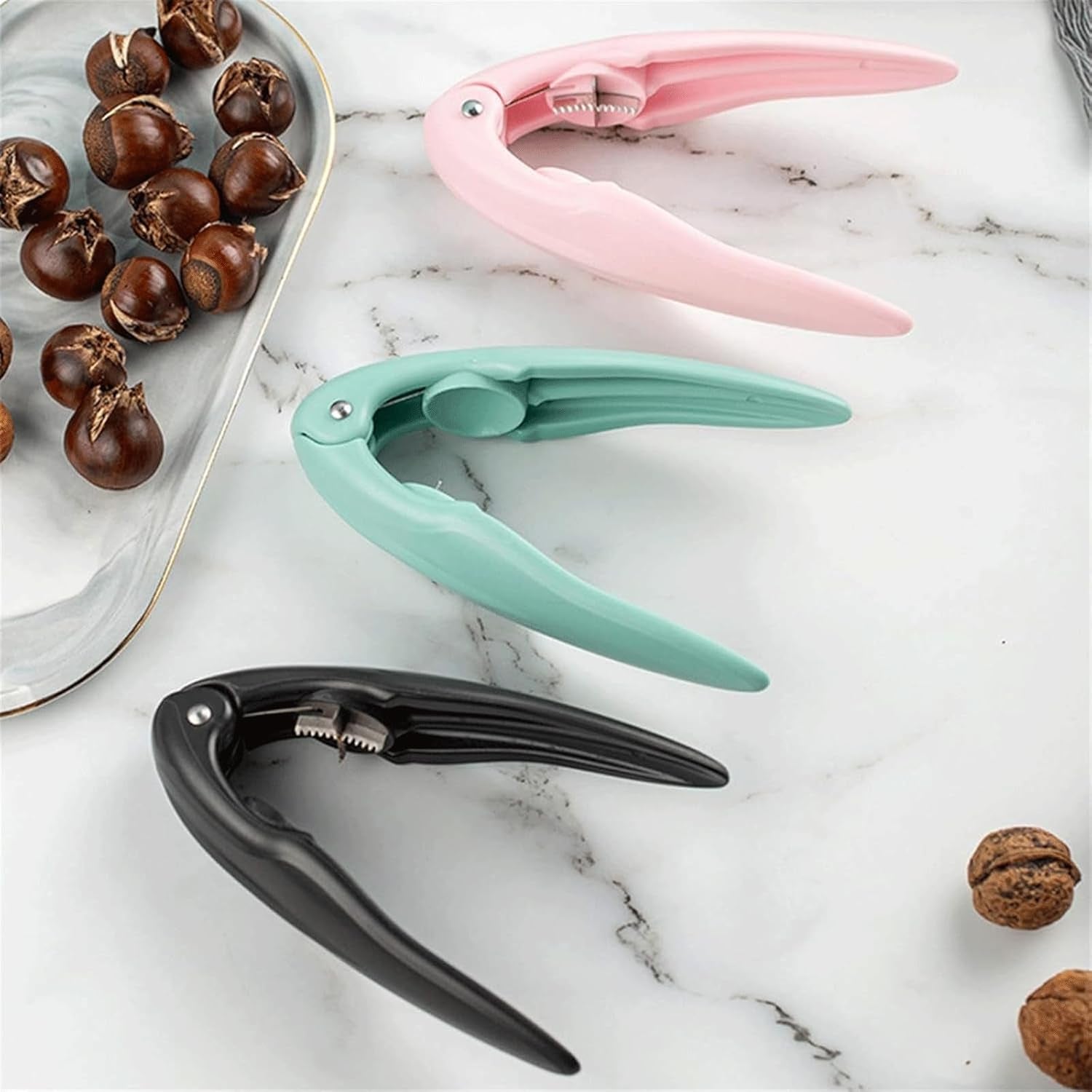 single piece nutcracker tool for daily kitchen needs, compact nut sheller for almonds and chestnuts, high quality stainless steel chestnut clip, efficient nut opener for kitchen accessories collection