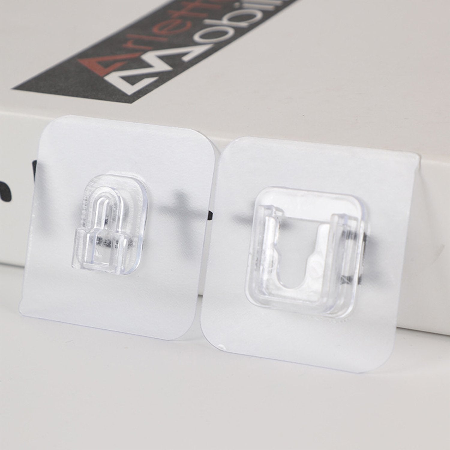 Pack of 20 heavy duty adhesive hooks, for reliable wall mounting. adhesive wall hooks, self adhesive hooks, heavy duty hooks, plastic wall hooks, reusable wall hooks, no drill hooks, transparent wall hooks, waterproof hooks