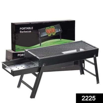 Compact folding barbecue grill for easy portability. portable charcoal grill, foldable BBQ grill, outdoor barbecue grill, camping grill, travel BBQ grill, garden charcoal stove, picnic BBQ setup