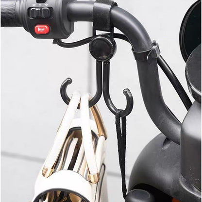 Pushchair hook accessory carrying purse while walking outdoors
