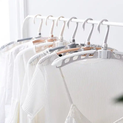 Non-slip folding clothes hanger designed for kids and adult garments to prevent slipping and deformation