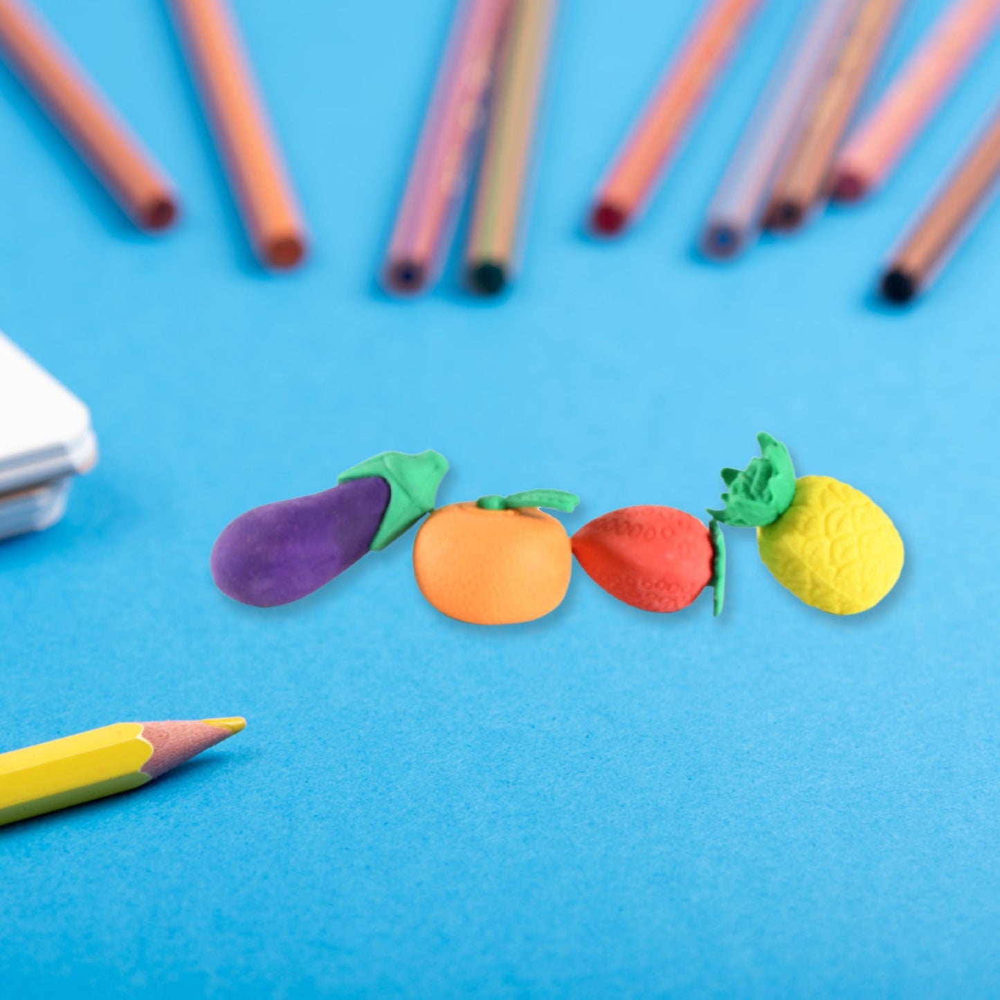 Novelty pencil eraser set featuring fruit and vegetable shapes