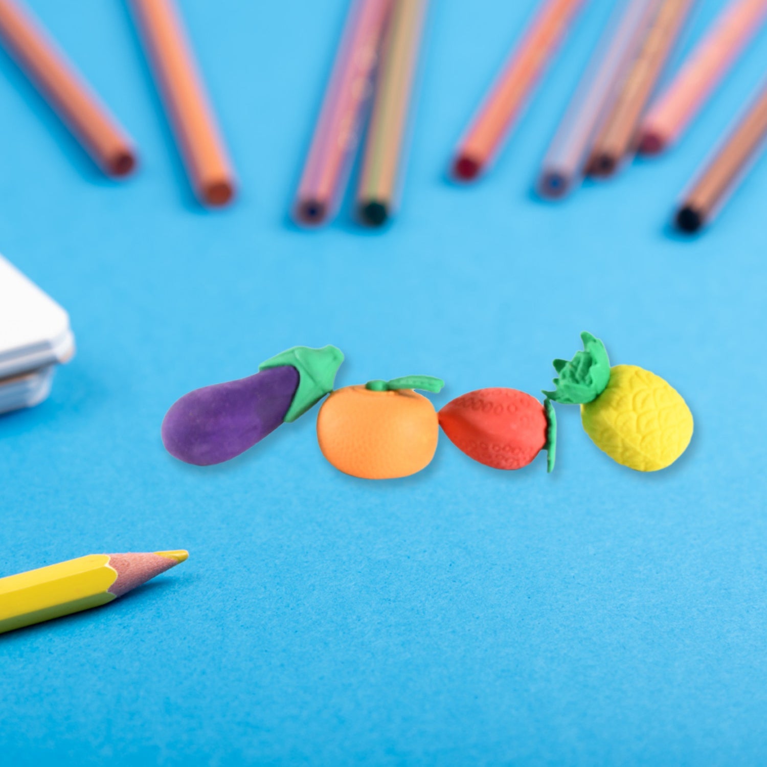 Novelty pencil eraser set featuring fruit and vegetable shapes