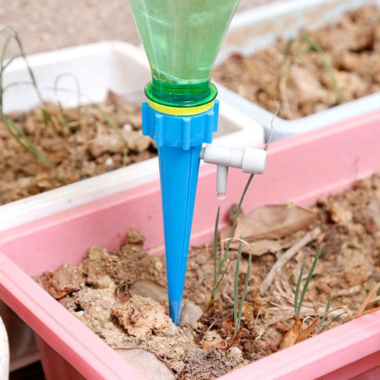 adjustable plant watering spike with control valve, 4 pc self-watering dripper spikes plastic, adjustable drip irrigation spike set, self-watering plant spike with valve control, reusable bottle plant watering spikes 4 pc

