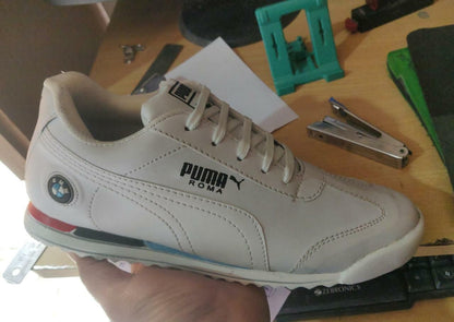 Puma white men’s casual shoes, white daily wear sneakers for men, lightweight Puma lace-up shoes men, men’s white synthetic casual shoes, Puma white lace-up sneakers men, comfortable white daily wear shoes men, men’s synthetic lightweight shoes Puma, stylish white casual sneakers men, Puma white shoes for daily use, men’s white synthetic lace-up shoes