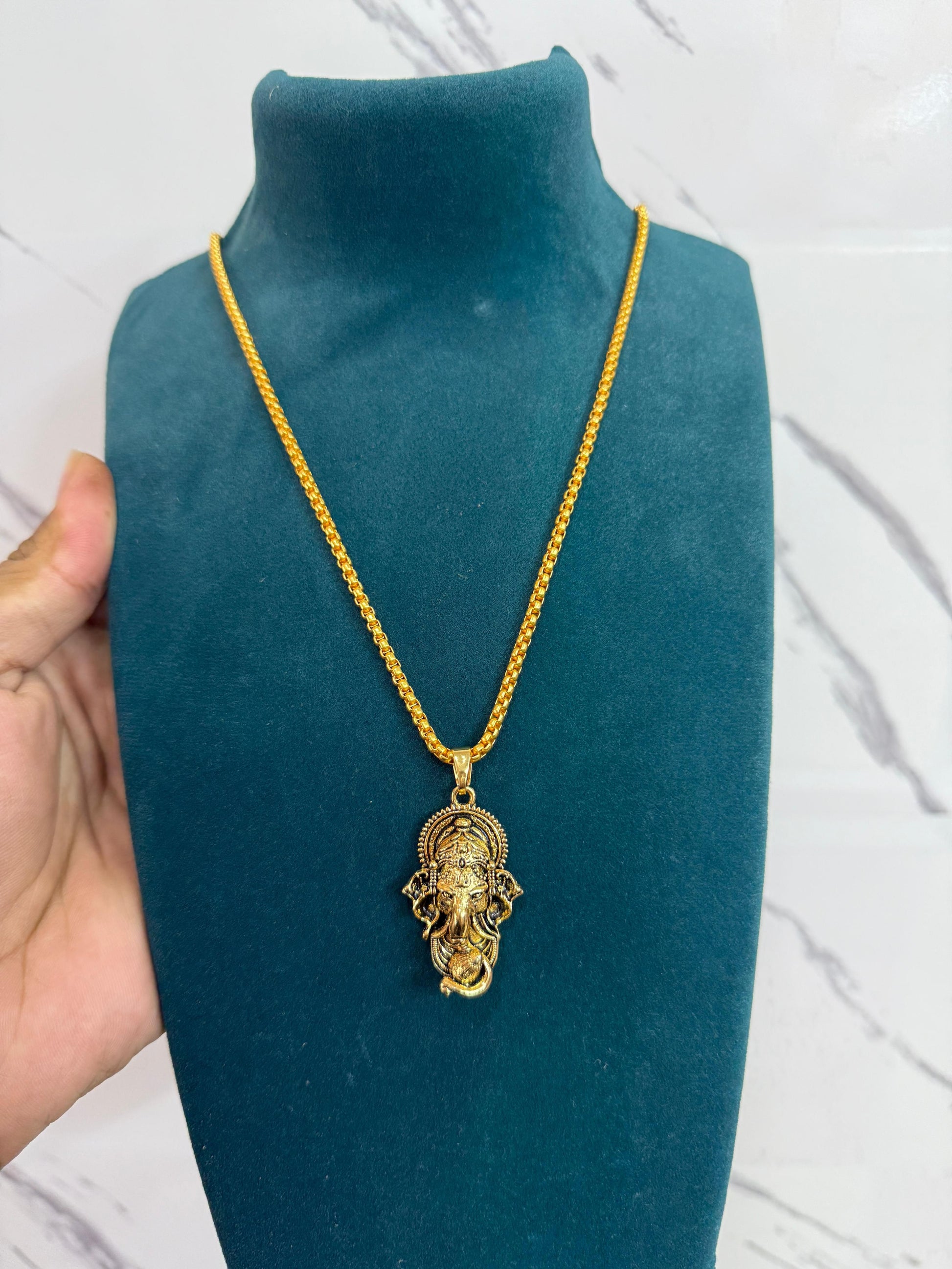ganesha jewelry men, gold plated ganesha pendant, snake chain pendant men, spiritual jewelry men, gold locket men, alloy chain pendant men, ganesha locket with chain, stylish pendant men, hindu god pendant men, gold plated chain for men

