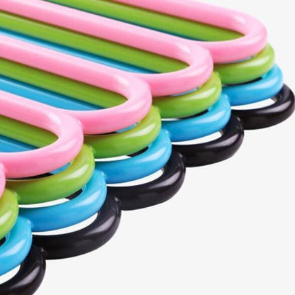 Plastic hanger with multiple layers for organizing garments. multipurpose plastic hanger, 5 in 1 hanger, clothes organizer, closet space saver, non-slip plastic hanger, trouser hanger, scarf belt tie organizer, wardrobe hanger set