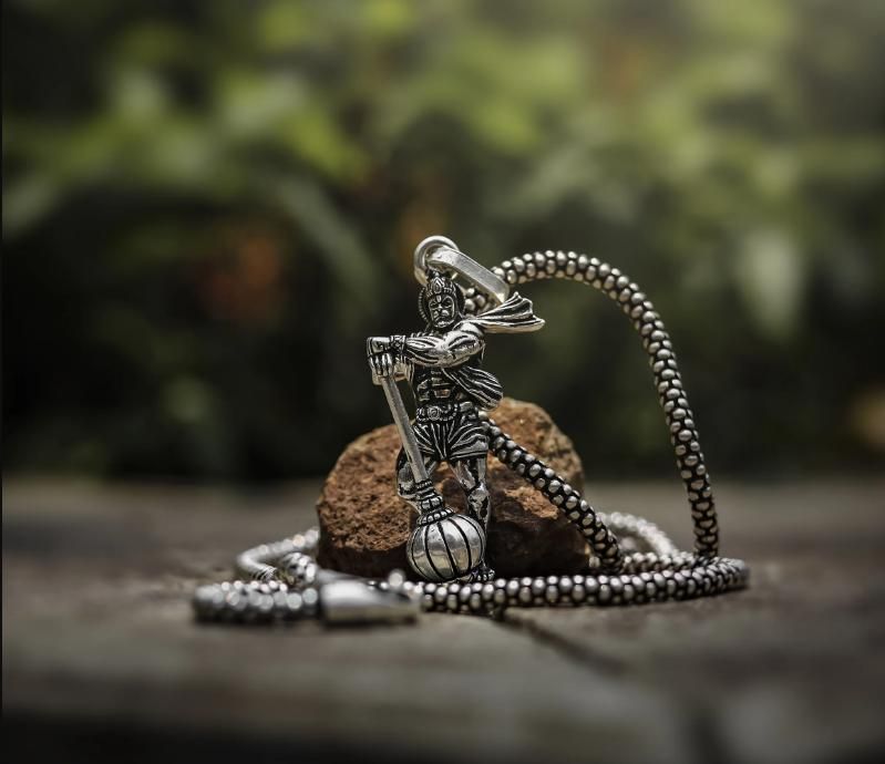 lord hanuman gada pendant necklace, spiritual hanuman locket chain for men, hanumanji silver locket with chain, silver hanuman gada chain for men, religious hanumanji pendant in silver, lord hanuman spiritual pendant necklace, silver chain with hanumanji and gada design, divine hanuman pendant with weapon symbol, hanumanji chain for daily spiritual wear