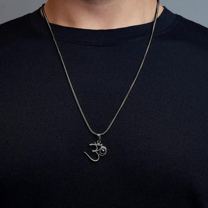 black stainless steel om pendant men, adiyogi spiritual pendant black steel, om locket with adiyogi design for men, men’s black stainless steel spiritual pendant, stylish om pendant with adiyogi, black steel pendant for men spiritual jewelry, adiyogi om pendant necklace men, spiritual black pendant with om and adiyogi, men’s stainless steel om spiritual locket