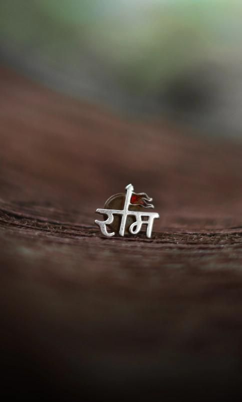 shree ram earring for men in silver stainless steel, single religious stud earring for men, silver devotional stud earring for men, stainless steel shree ram stud earring, men's silver religious stud earring, buy shree ram earring online india, devotional single stud earring in silver for men, religious stainless steel earring for men, silver stud earring with shree ram design, men's spiritual stud earring in silver

