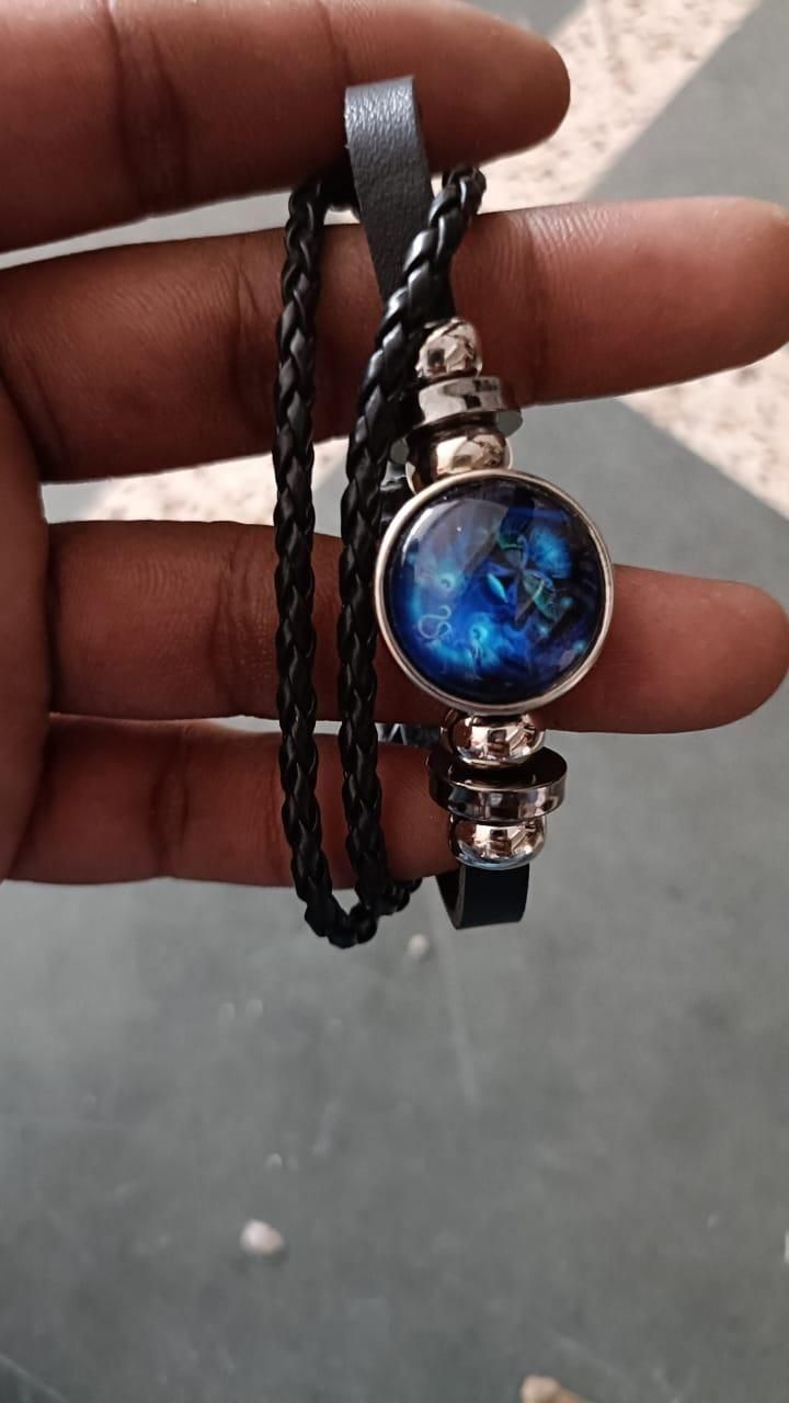 astrology jewelry, zodiac charm accessories, constellation star sign bracelet, zodiac leather wristband, horoscope zodiac sign gifts, black astrology wristband, zodiac sign fashion accessory, adjustable star sign bracelet, unisex zodiac jewelry india, constellation design leather bracelet

