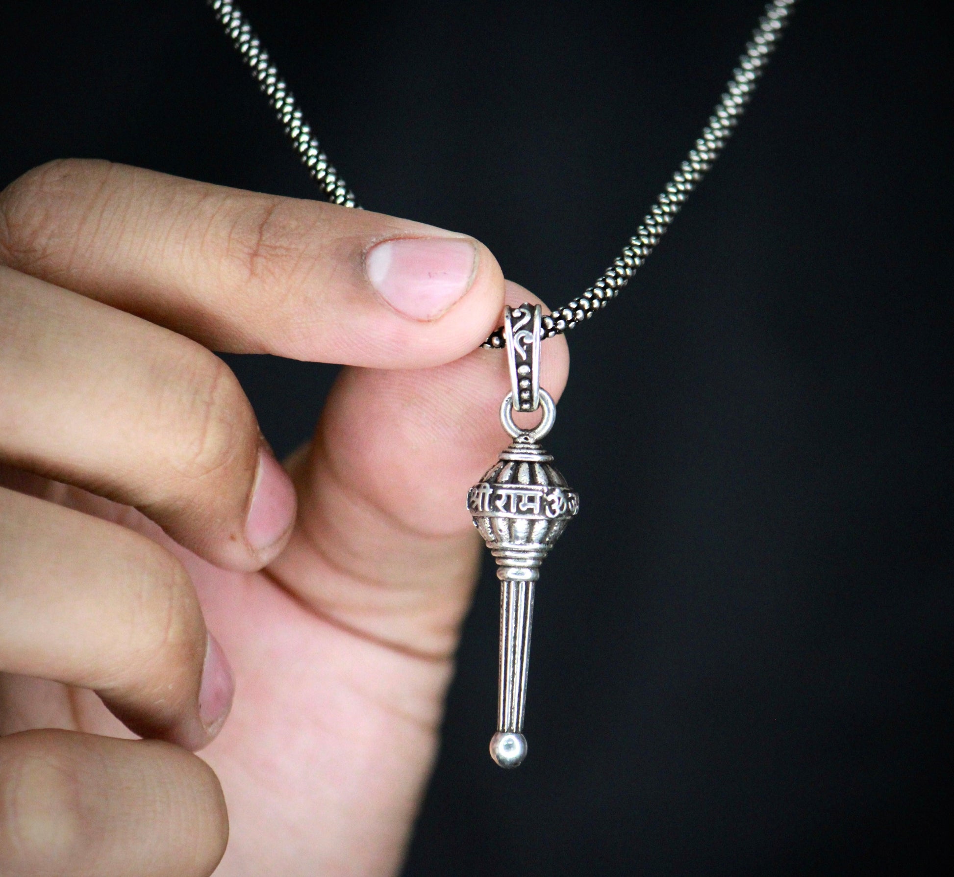 hanuman gada pendant with silver chain, divine locket for men in silver, silver hanuman weapon pendant chain, spiritual gada locket necklace for men, lord hanuman gada pendant in silver, silver chain with hanuman style gada, devotional silver pendant for men, stylish gada pendant necklace for men, silver hanuman gada chain for daily wear
