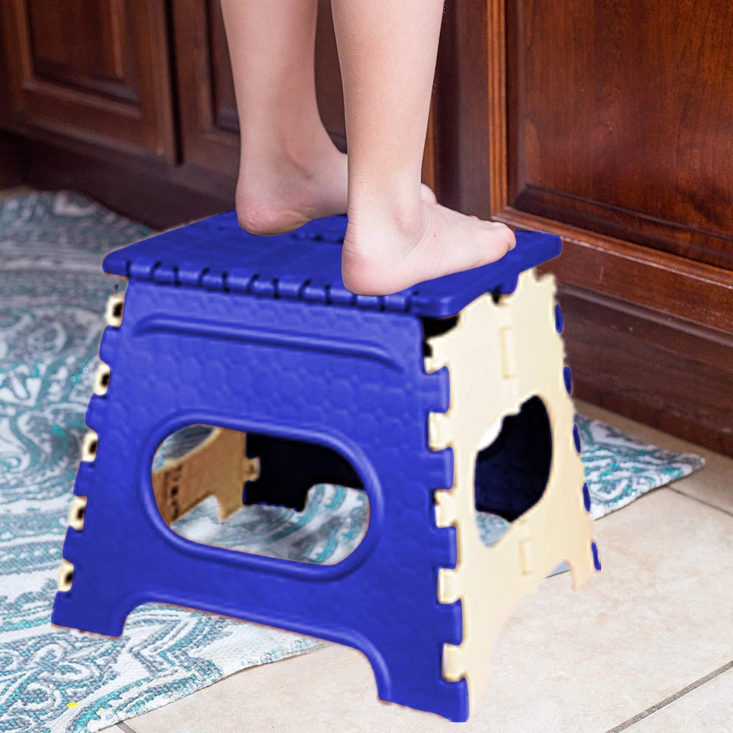 Durable folding step stool with a vibrant multicolor design and a handle for easy portability. folding plastic step stool, 12 inch step stool, non slip step stool, heavy duty stool, foldable stool for kids, kitchen step stool, portable stool for bathroom