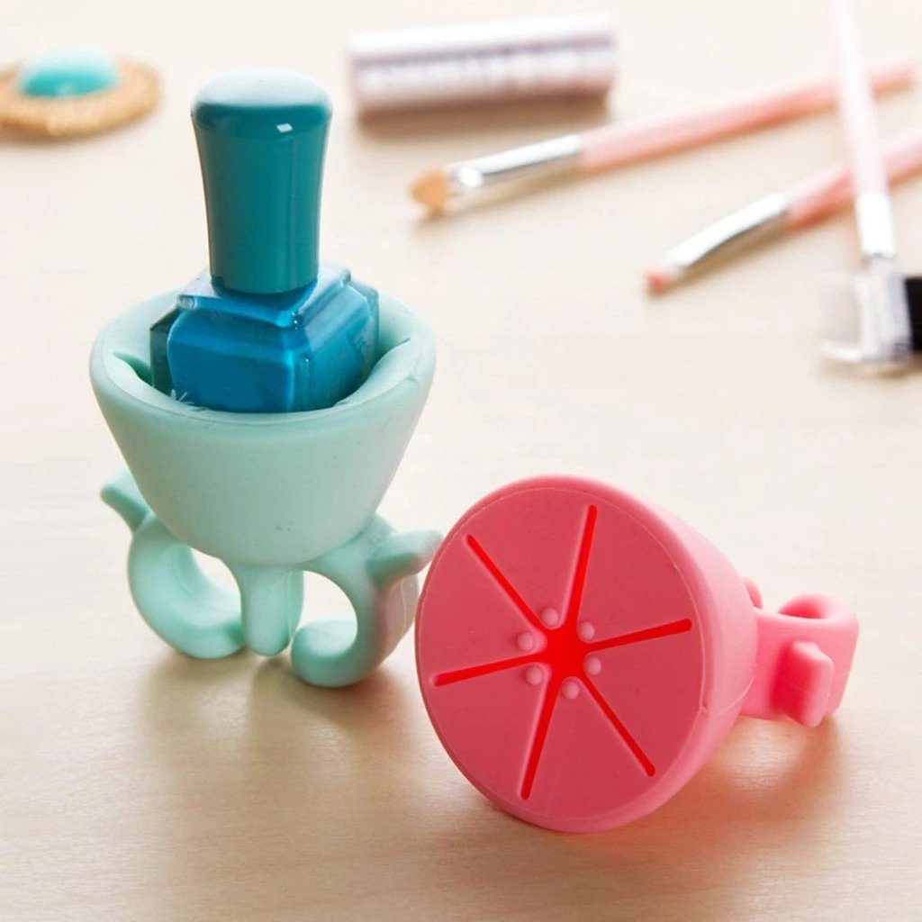 Nail polish holder ring with stand, detailed view. nail polish holder ring, silicone nail polish stand, manicure tool, pedicure accessory, portable nail holder, spill proof nail painting tool, fingernail polish ring, nail art accessories, hands-free nail polish holder, nail bottle holder ring