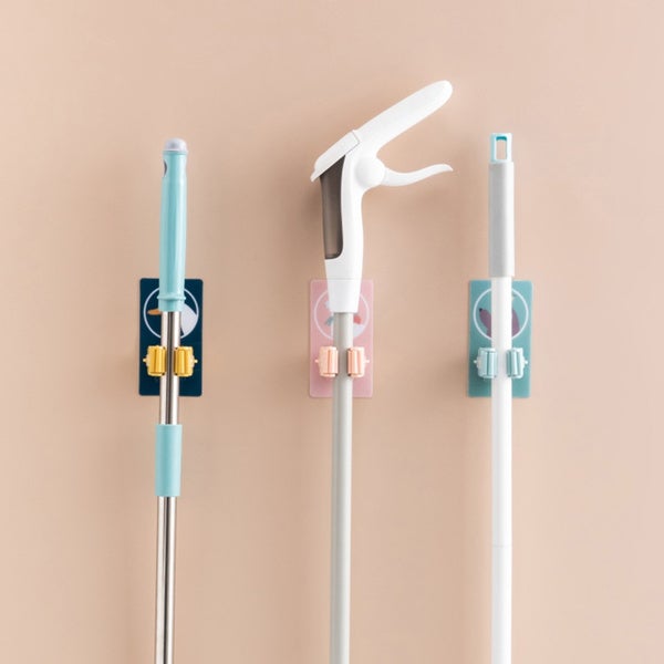 Self-adhesive mop and broom organizer for space-saving storage. wall mounted mop holder, broom organizer, self adhesive holder, kitchen mop rack, reusable wall hanger, anti-slip mop hook, storage rack for tools, mop clip holder