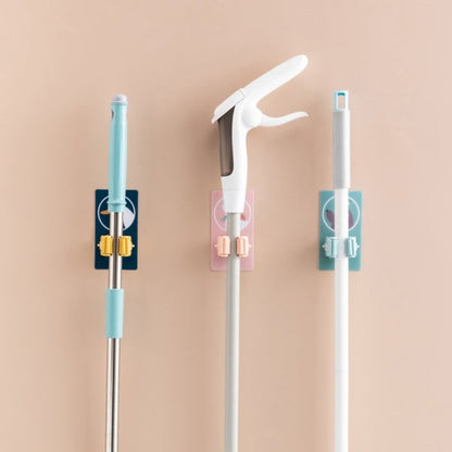 Self-adhesive mop and broom organizer for space-saving storage. wall mounted mop holder, broom organizer, self adhesive holder, kitchen mop rack, reusable wall hanger, anti-slip mop hook, storage rack for tools, mop clip holder
