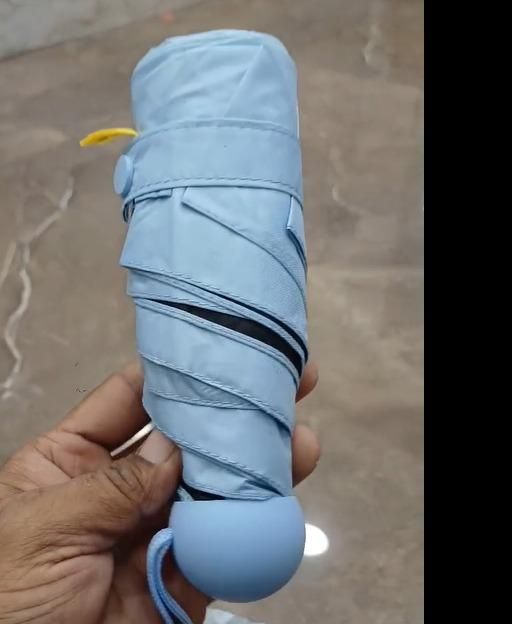 mini folding umbrella India, compact travel umbrella, lightweight travel umbrella India, portable folding umbrella India, capsule umbrella travel, travel umbrella compact size, mini umbrella for travel India, folding umbrella portable, compact umbrella India, travel umbrella lightweight portable

