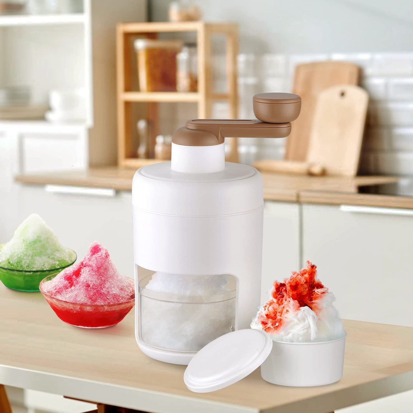 Hand-cranked ice crusher and shaved ice machine for making smoothies. gola maker, manual ice crusher, shaved ice machine, snow cone maker, smoothie ice crusher, ice shaver for home, portable gola machine