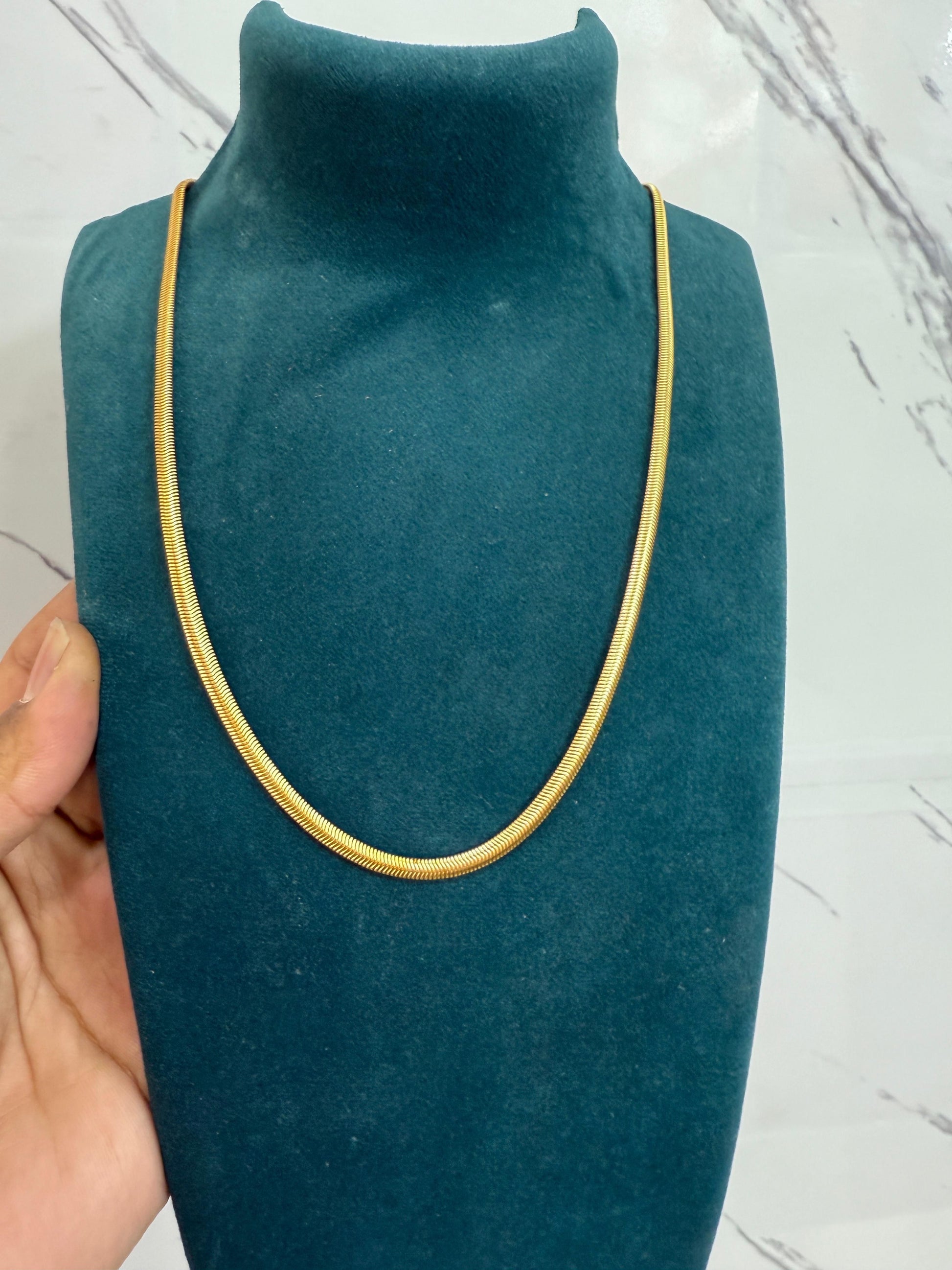 men’s golden snake chain gold plated stainless steel necklace, best gold plated snake chain necklace for men India, durable stainless steel golden chain for casual wear, men’s casual gold chain with snake design, gold plated necklace for men daily wear, stainless steel snake chain for men fashion, stylish golden chain necklace for men, lightweight gold plated chain for office and casual use, men’s gold plated stainless steel chain online India, trendy golden snake chain for men outfits

