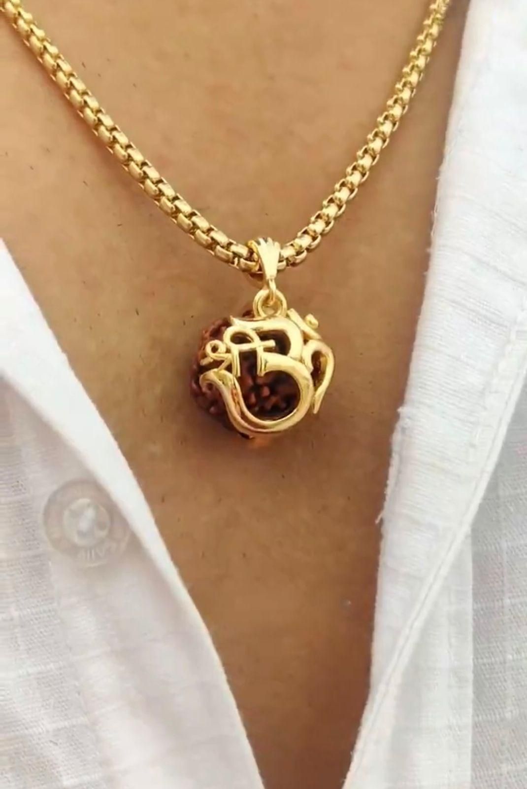 om rudraksha pendant, gold alloy chain men, casual spiritual jewelry, rudraksha pendant men, spiritual pendant for men, rudraksha jewelry, gold alloy pendant men, men's spiritual jewelry, casual pendant men, rudraksha necklace men

