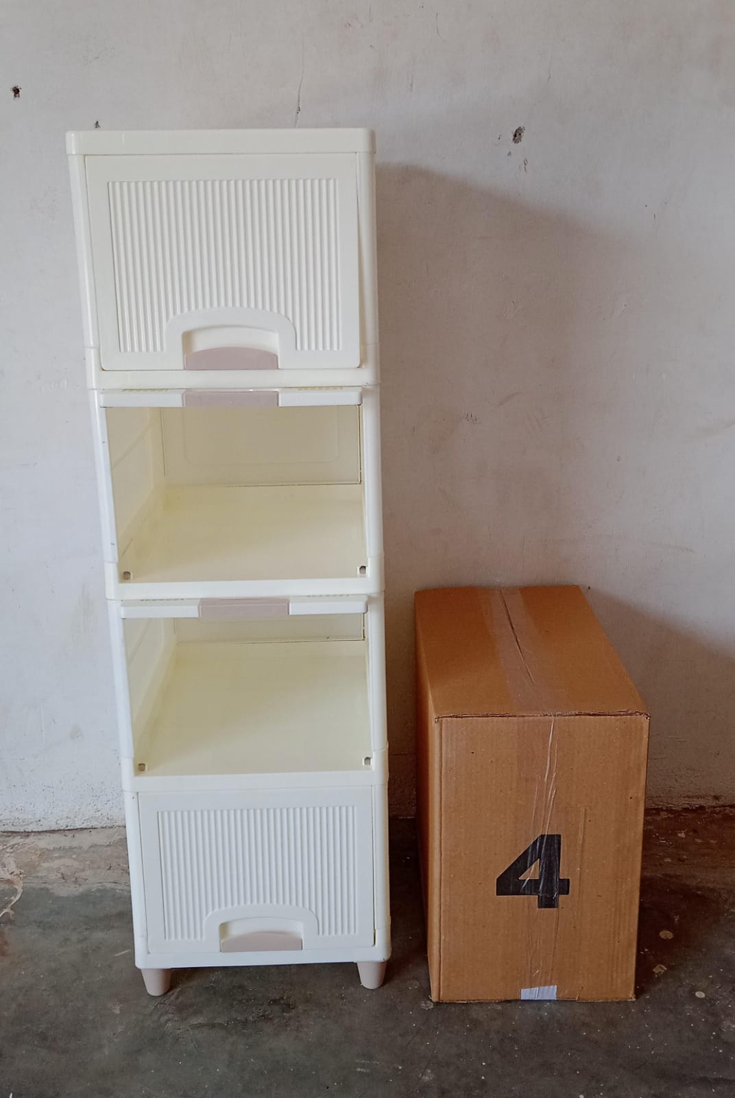 plastic storage cabinet, foldable drawer unit, multipurpose plastic organizer, 4 layer drawer cabinet, plastic furniture for storage, home and office drawer unit, modular storage cabinet, clothes and toy storage drawers, compact plastic cabinet, foldable storage shelf, plastic drawer organizer, utility storage unit

