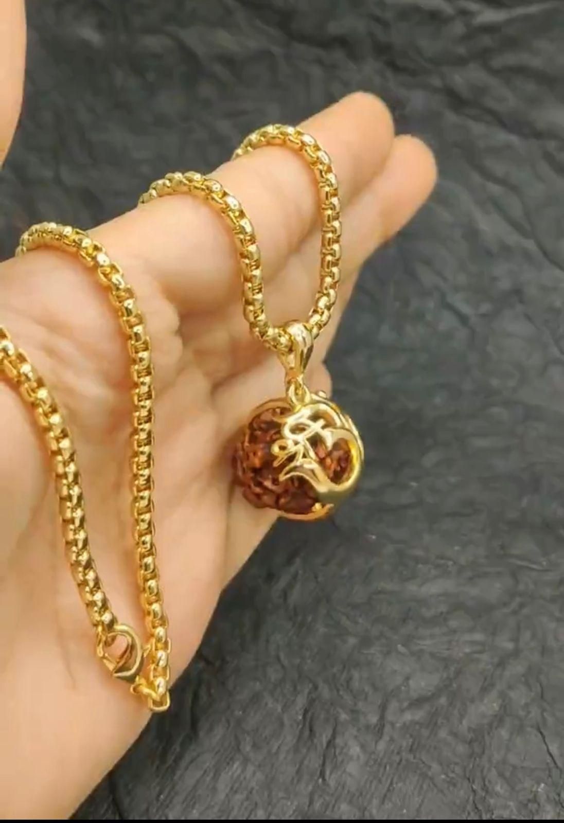 casual spiritual jewelry om rudraksha pendant, men’s gold alloy rudraksha necklace, rudraksha pendant with chain gold alloy, om spiritual pendant for men, gold alloy rudraksha locket men, casual om rudraksha pendant necklace, men's spiritual rudraksha jewelry gold alloy, rudraksha pendant chain for men, gold alloy casual spiritual pendant men