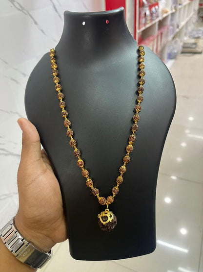 5 mukhi rudraksha chain for men gold plated brass mala, gold plated spiritual rudraksha mala for men, brass rudraksha necklace with gold plating, men's 5 mukhi rudraksha gold plated chain, spiritual brass mala with rudraksha beads, buy gold plated rudraksha chain online india, 5 mukhi rudraksha mala for daily wear, gold finish rudraksha spiritual jewelry for men, brass mala with 5 mukhi rudraksha beads, spiritual rudraksha chain for men in gold plating

