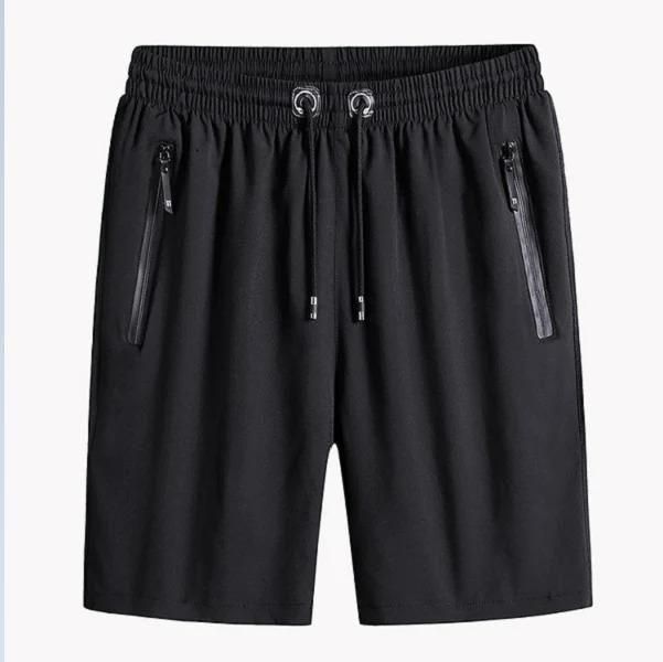 Black shorts with zippers on a white background