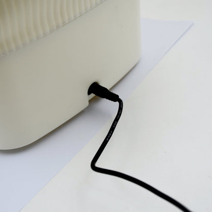 Portable foldable washing machine in use cleaning socks and underwear