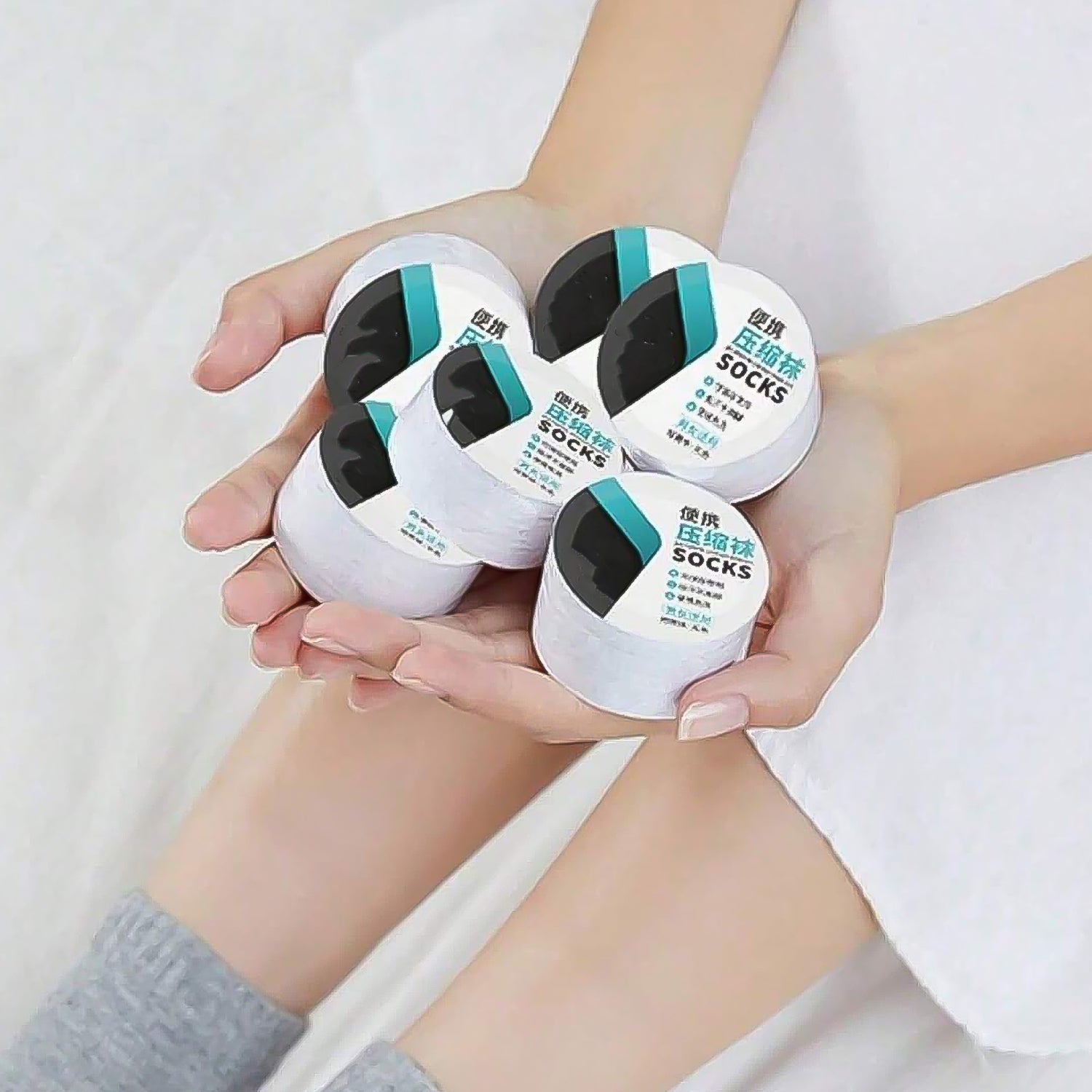 Travel friendly disposable socks packaged compact for daily use