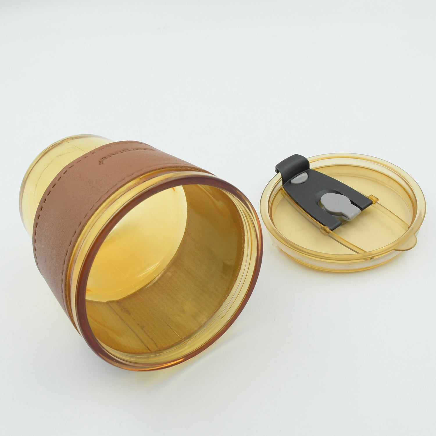 Heatproof glass tea cup with stylish vegan leather grip sleeve