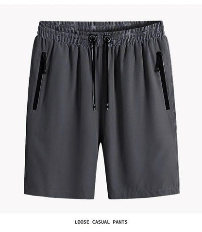 Gray loose casual pants with zippers on a white background