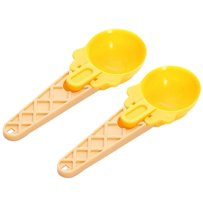 Two plastic ice cream scoops with trigger handles for easy serving
