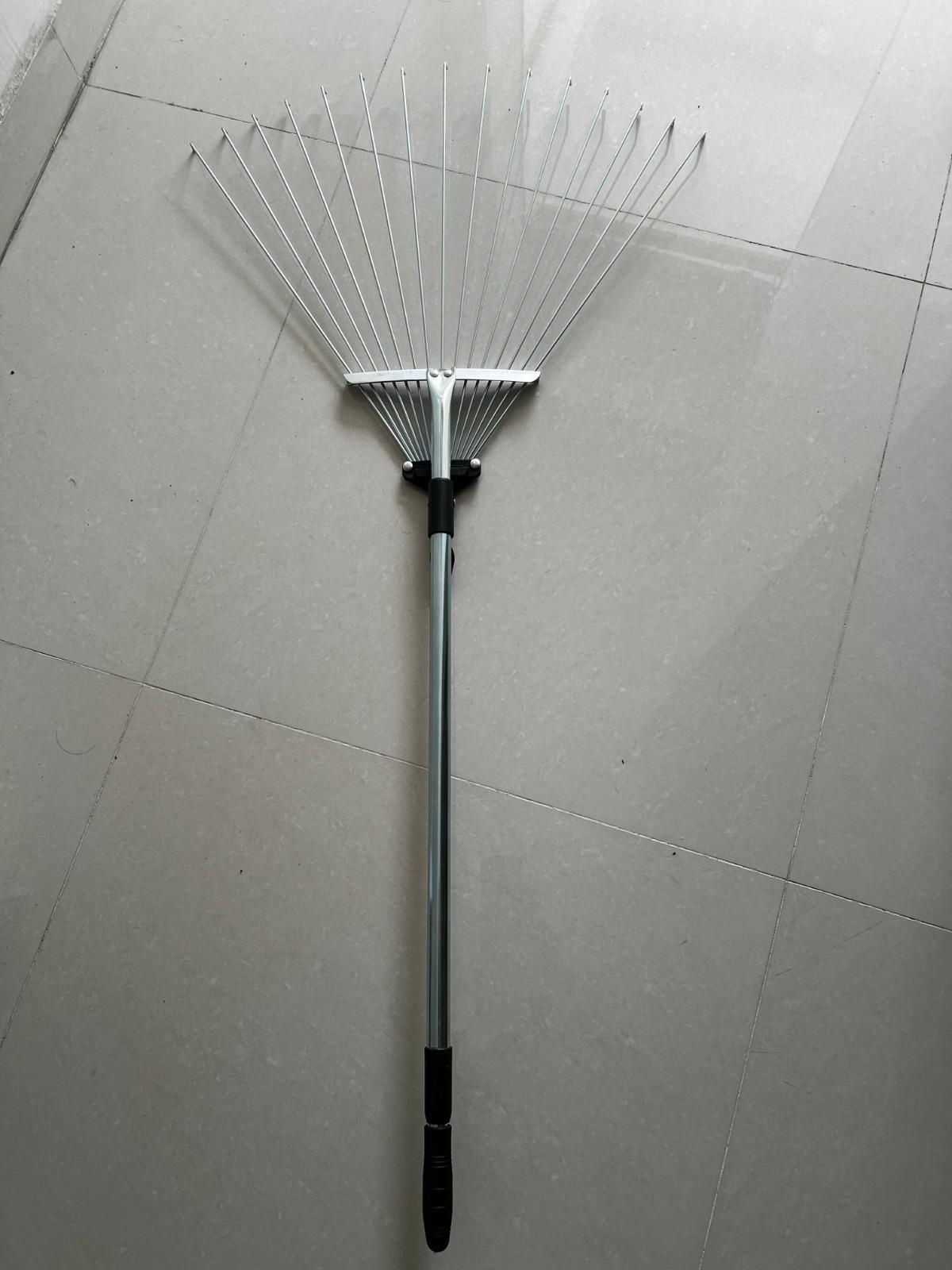 Adjustable rake head showing expansion capability for garden yard cleaning and cultivated fields maintenance