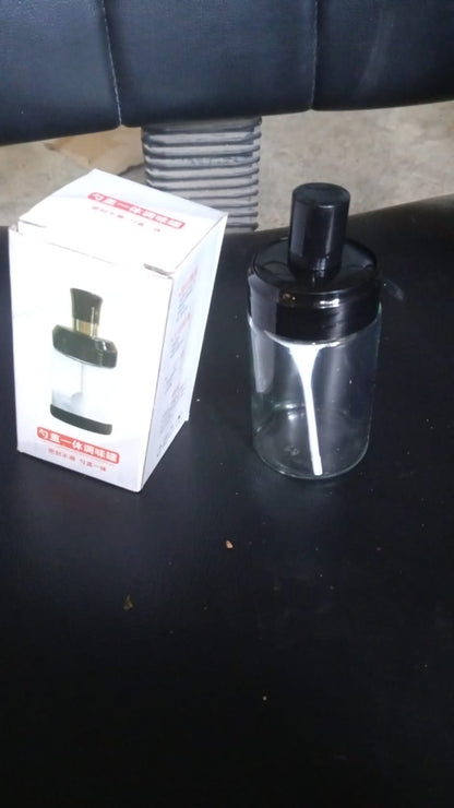 Airtight container glass seasoning jar with attached scoop spoon