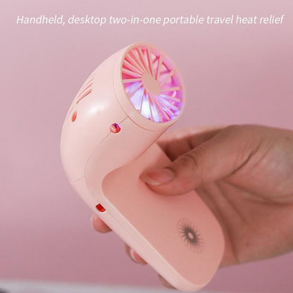 Compact table fan with portable phone holder, travel friendly