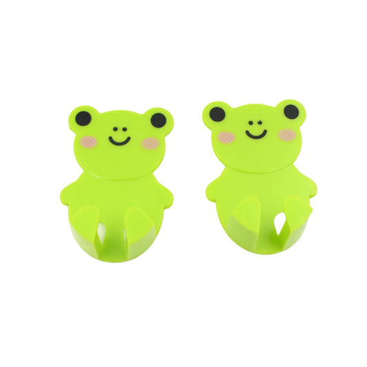 Plastic adhesive cable plug hook holding power plugs in kitchen