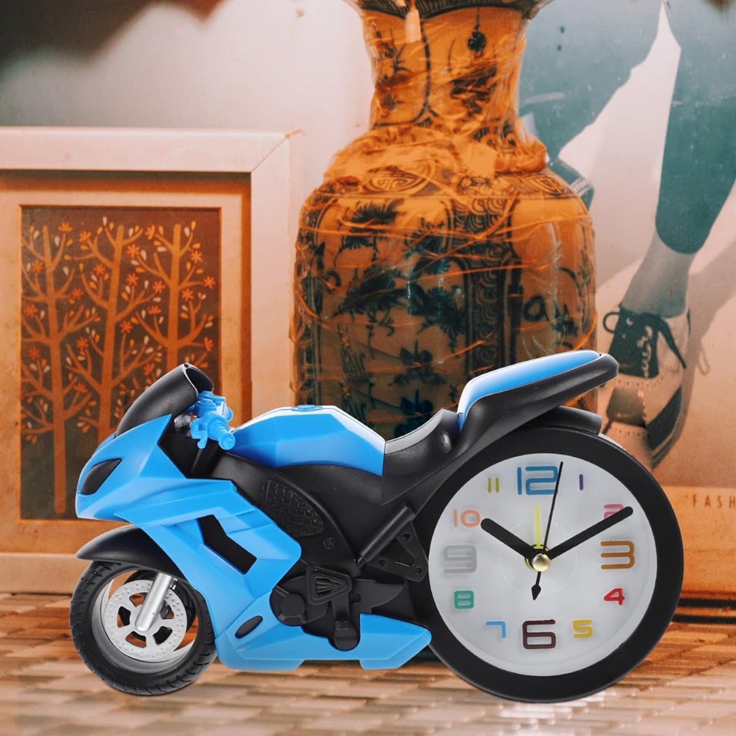 Retro styled motorcycle engine alarm clock on desk
