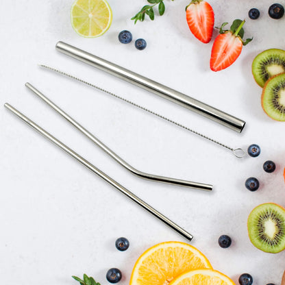 Set of four stainless steel straws shown with cleaning brush
