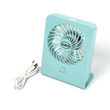 Small desktop fan with protective blade cover and 3 speeds