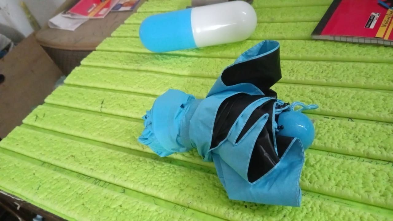 ultra light travel umbrella pocket size, foldable travel umbrella for men and women,