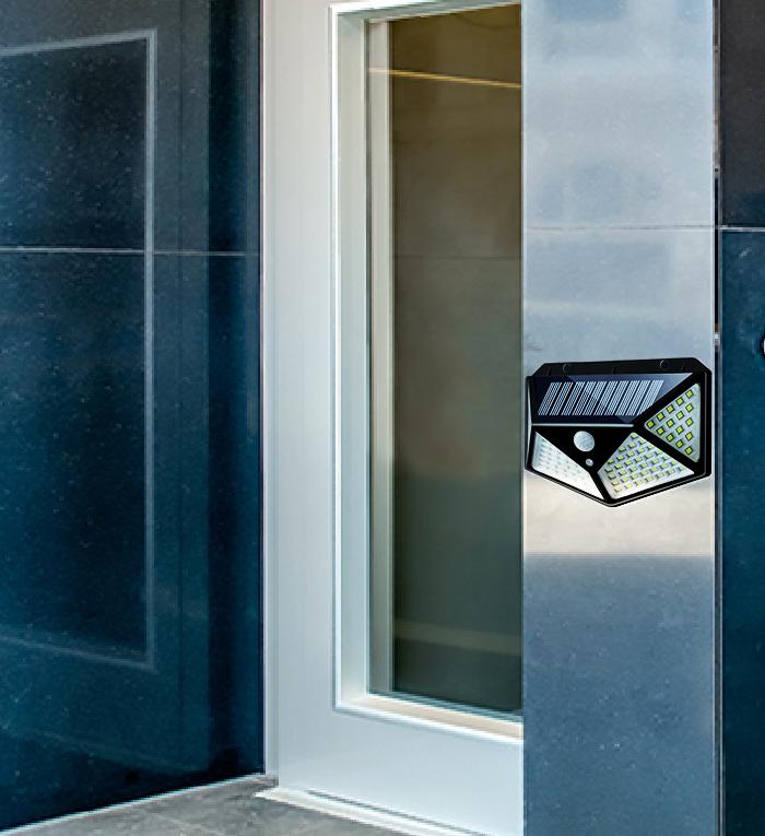 Solar-powered LED security lamp for garden pathways and home use. solar wall light, 100 led outdoor lamp, motion sensor solar light, waterproof garden light, outdoor security light, solar powered lamp for home, PIR sensor light, balcony solar light, solar motion light India