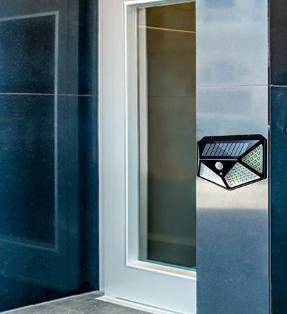 Solar-powered LED security lamp for garden pathways and home use. solar wall light, 100 led outdoor lamp, motion sensor solar light, waterproof garden light, outdoor security light, solar powered lamp for home, PIR sensor light, balcony solar light, solar motion light India